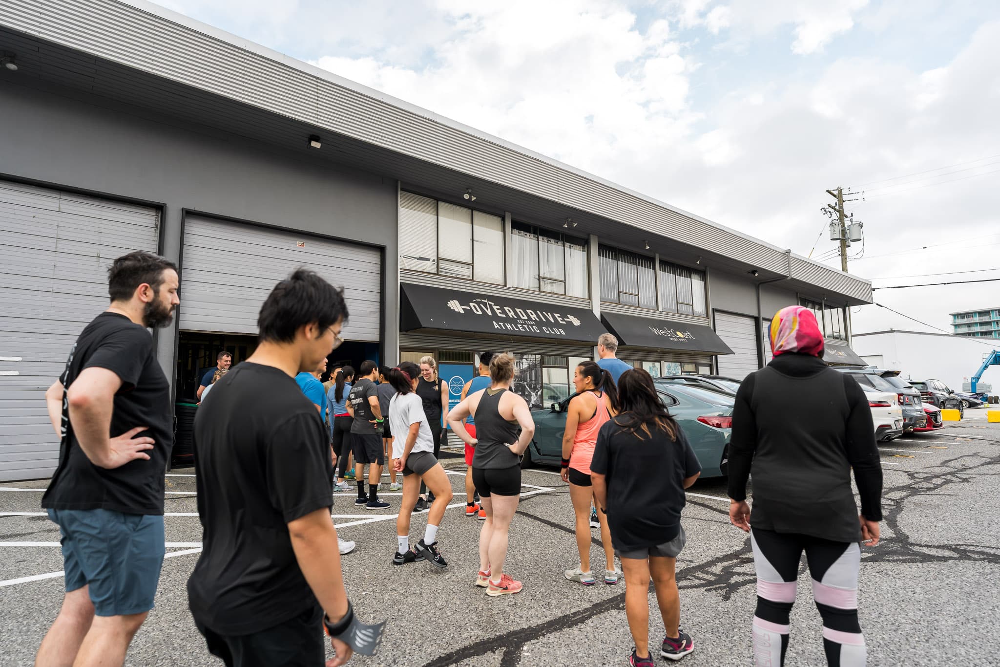Members gathered outside Overdrive Athletic Club before a session in Richmond, BC